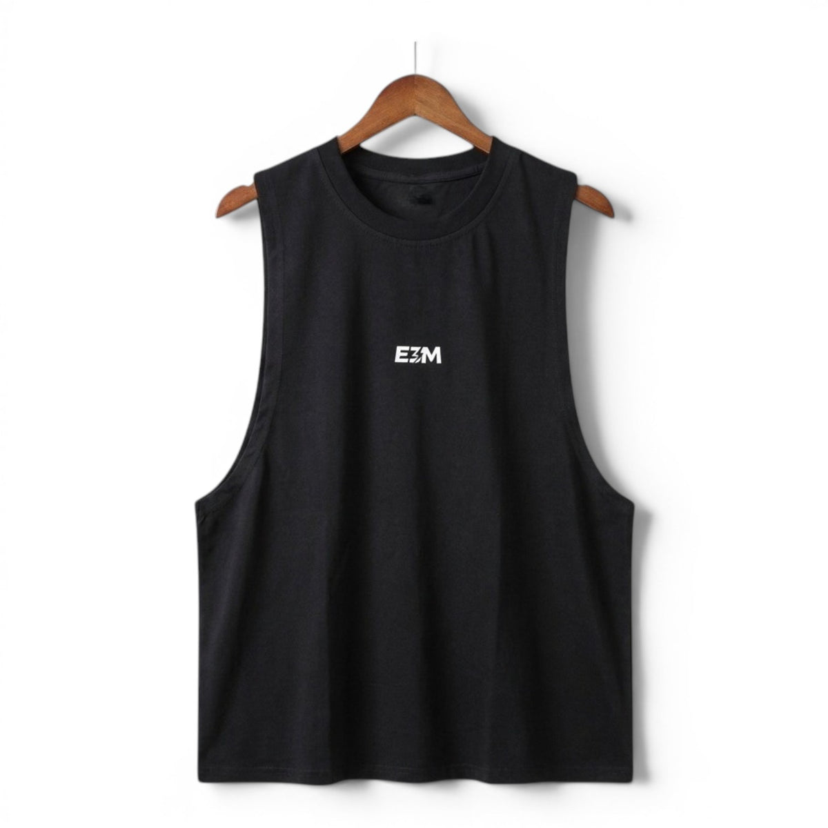 Black E3M Training Vest on a hanger, front view